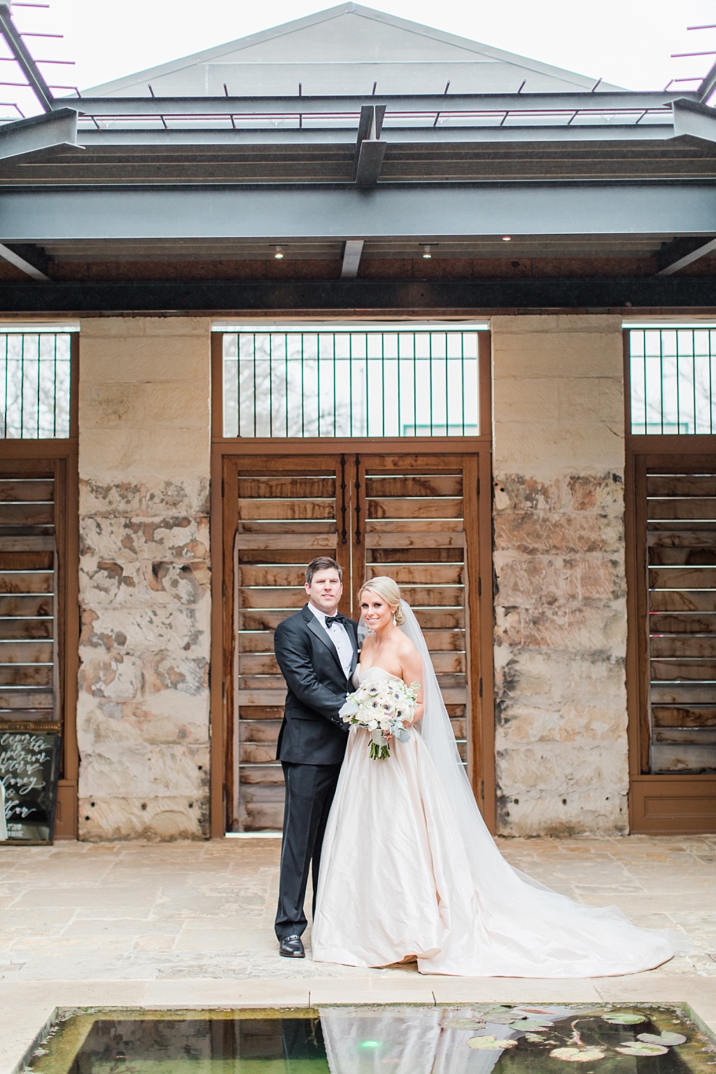 An Art Deco Black Tie Wedding at The Ingenhuett On High in Comfort Texas Featuring a Bentley Vintage Car and Blush Wedding Dress 0053