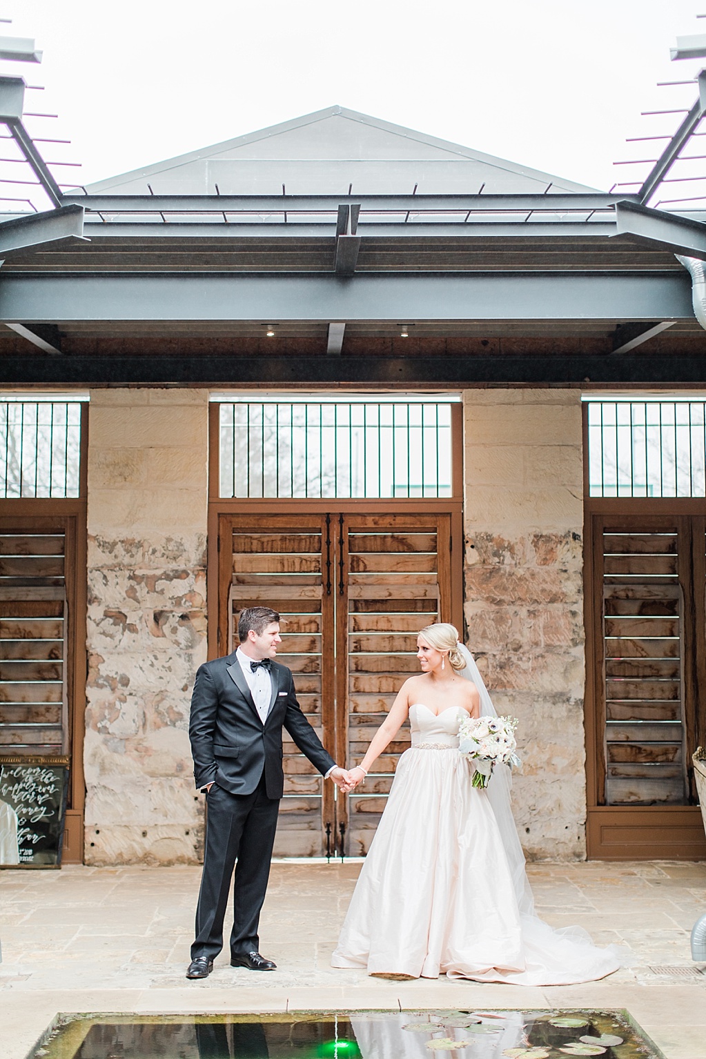 An Art Deco Black Tie Wedding at The Ingenhuett On High in Comfort Texas Featuring a Bentley Vintage Car and Blush Wedding Dress 0054