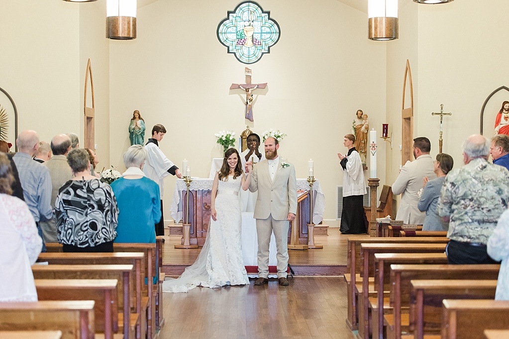 A Sring blush Catholic Wedding in Fredericksburg Texas featuring a volkswagon bus 0045