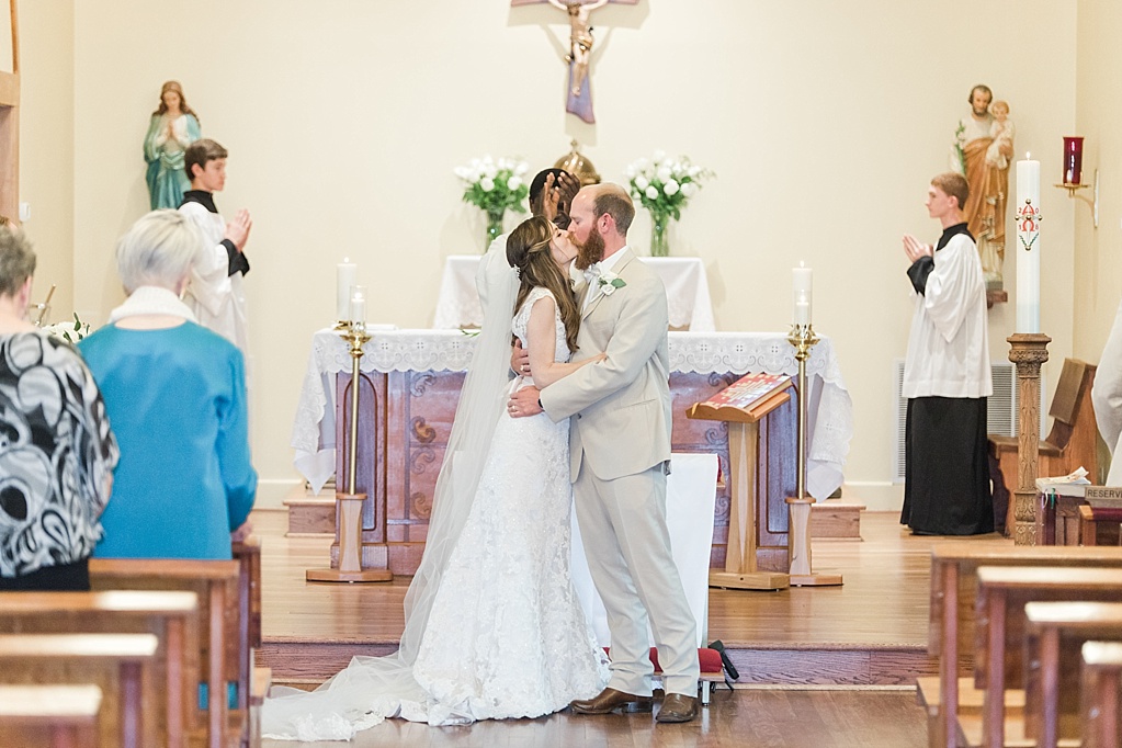 A Sring blush Catholic Wedding in Fredericksburg Texas featuring a volkswagon bus 0046