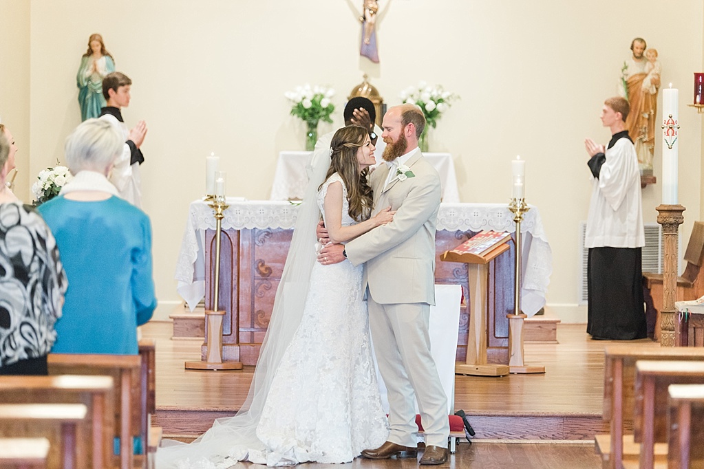 A Sring blush Catholic Wedding in Fredericksburg Texas featuring a volkswagon bus 0047
