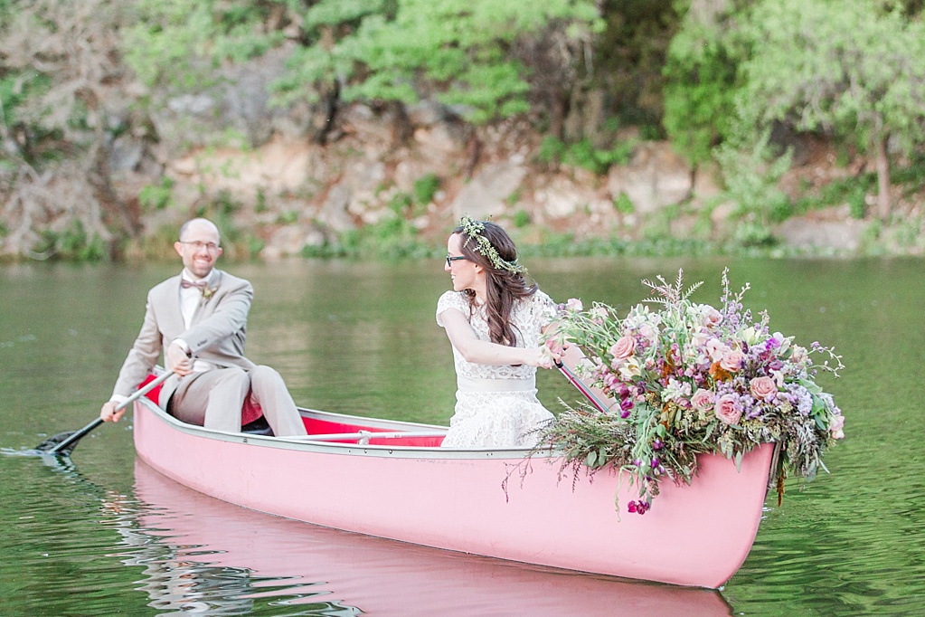 A minimalist ranch wedding in the Texas Hill Country featuring a canoe bridal party entrance and night portrait. 0074