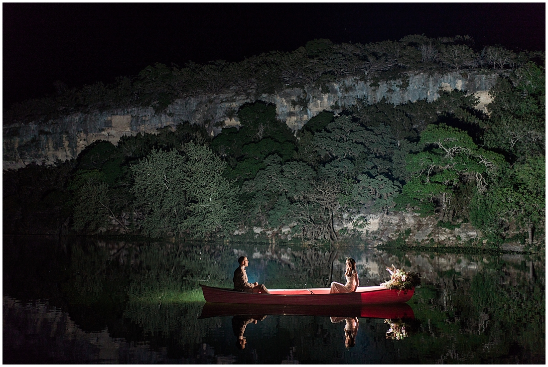 A minimalist ranch wedding in the Texas Hill Country featuring a canoe bridal party entrance and night portrait. 0086