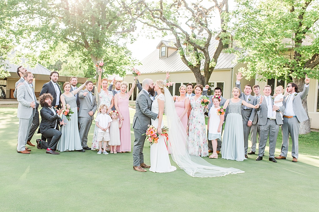 A floral watercolor spring wedding at The Riverhill Mansion and Country Club in Kerrville Texas by Allison Jeffers Wedding Photography 0059