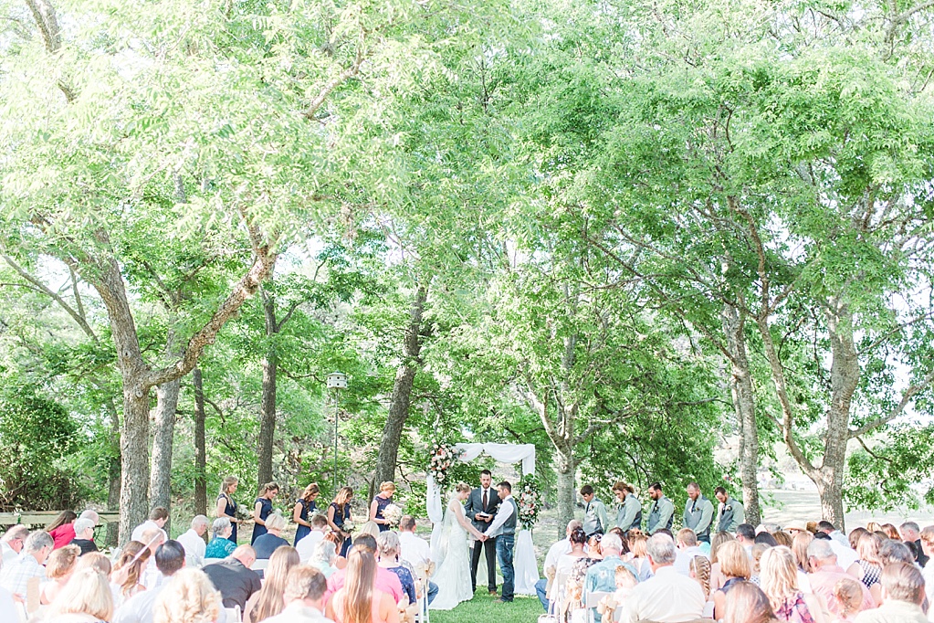A fun summer wedding at Don Strange Ranch in Boerne Texas by Allison Jeffers Photography 0058