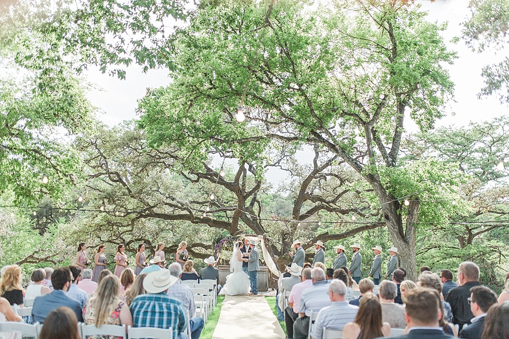 A misty purple and dusty rose Summer Wedding at Sisterdale Dancehall in Boerne Texas 0034