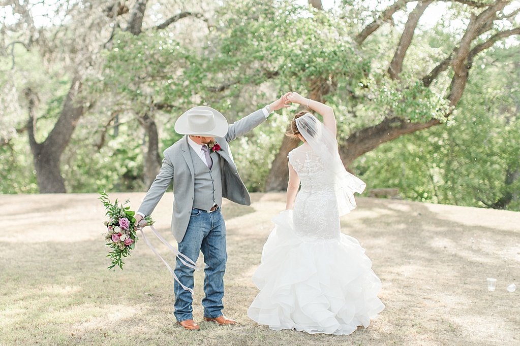 A misty purple and dusty rose Summer Wedding at Sisterdale Dancehall in Boerne Texas 0061
