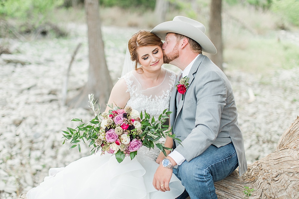 A misty purple and dusty rose Summer Wedding at Sisterdale Dancehall in Boerne Texas 0064