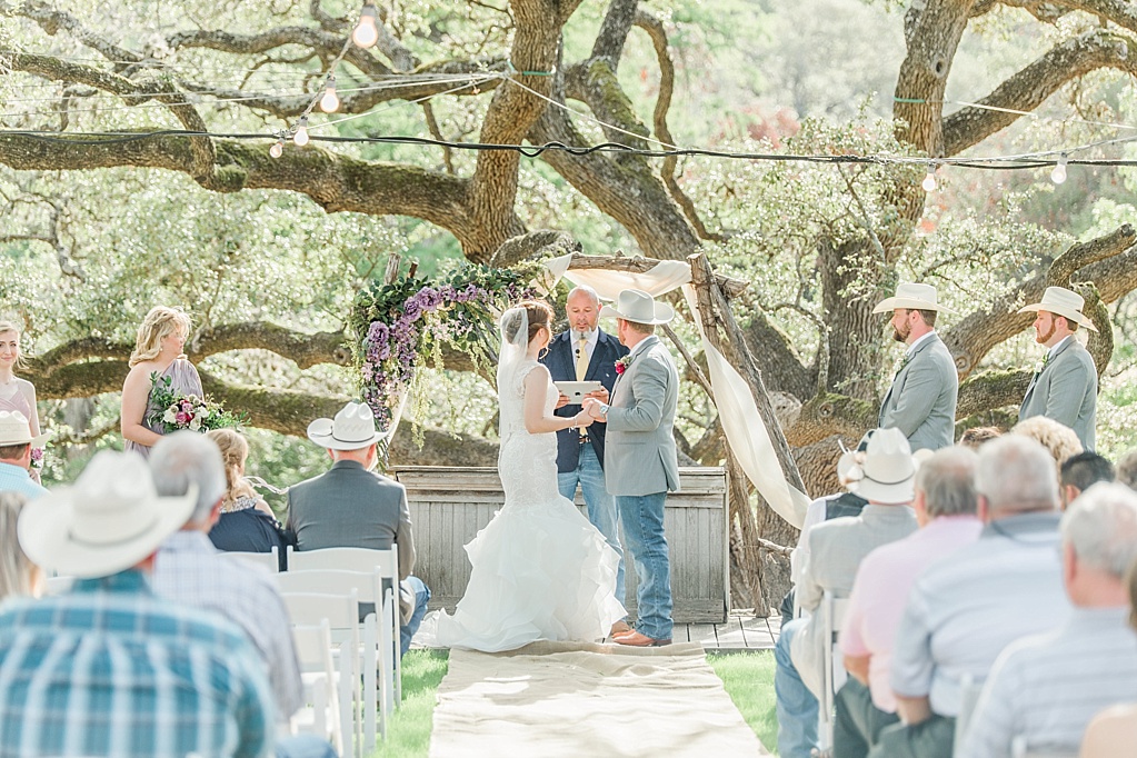 A misty purple and dusty rose Summer Wedding at Sisterdale Dancehall in Boerne Texas 0104