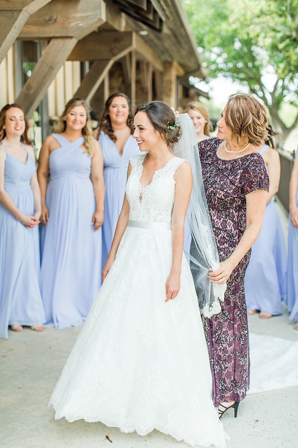 A lavender and ivory summer wedding at the lodge at country inn cottages in Fredericksburg tx by Allison Jeffers photography 0018