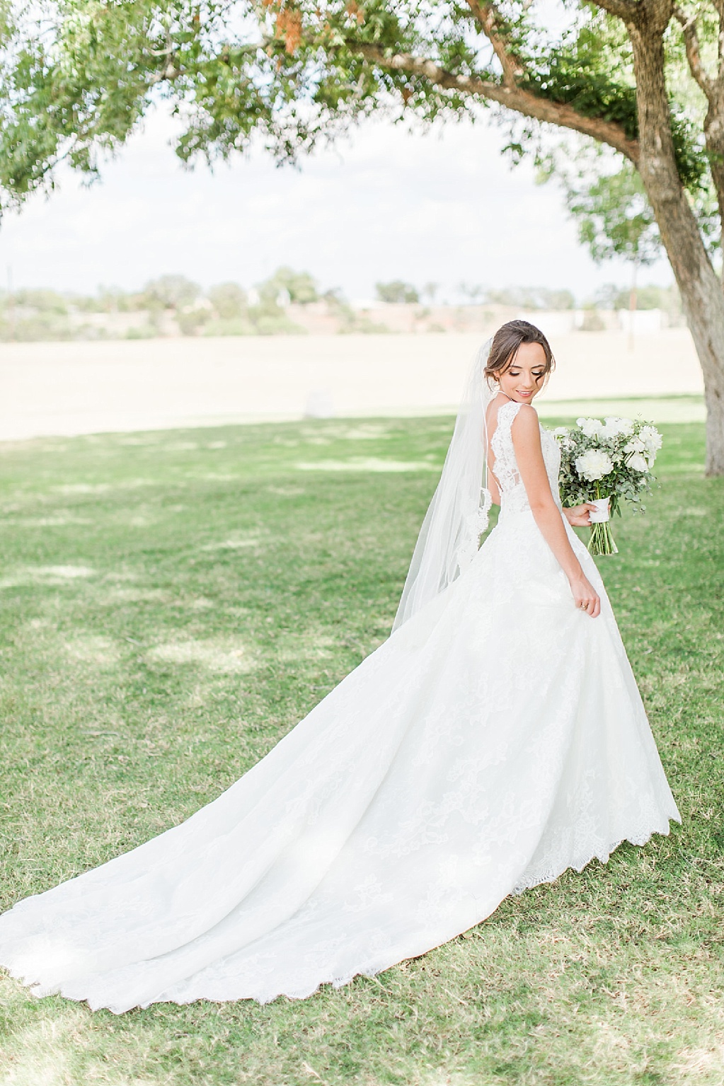 A lavender and ivory summer wedding at the lodge at country inn cottages in Fredericksburg tx by Allison Jeffers photography 0031