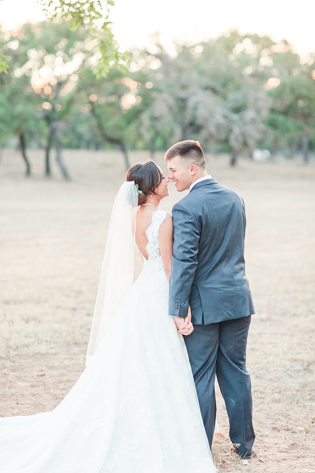 A lavender and ivory summer wedding at the lodge at country inn cottages in Fredericksburg tx by Allison Jeffers photography 0140