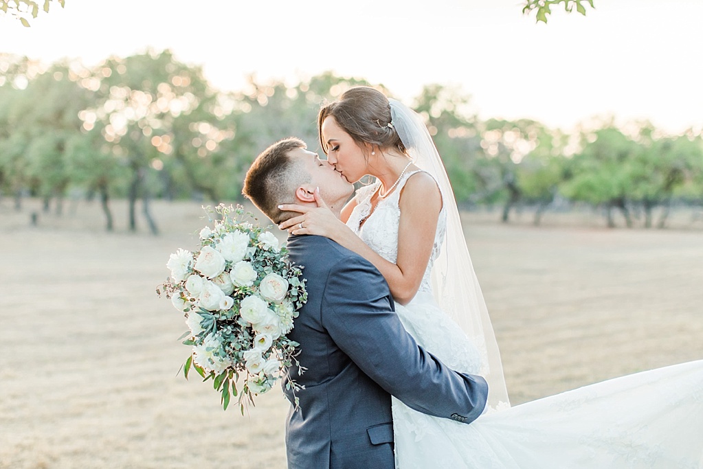 A lavender and ivory summer wedding at the lodge at country inn cottages in Fredericksburg tx by Allison Jeffers photography 0143
