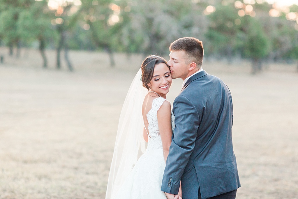 A lavender and ivory summer wedding at the lodge at country inn cottages in Fredericksburg tx by Allison Jeffers photography 0144