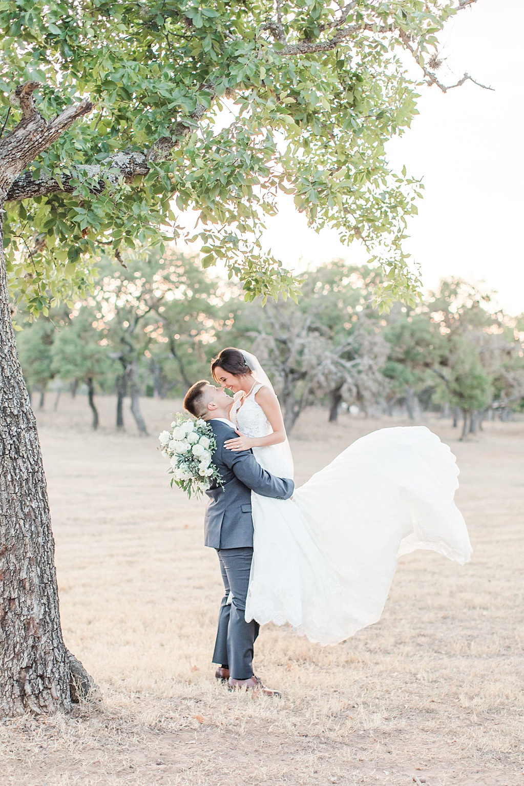 A lavender and ivory summer wedding at the lodge at country inn cottages in Fredericksburg tx by Allison Jeffers photography 0145