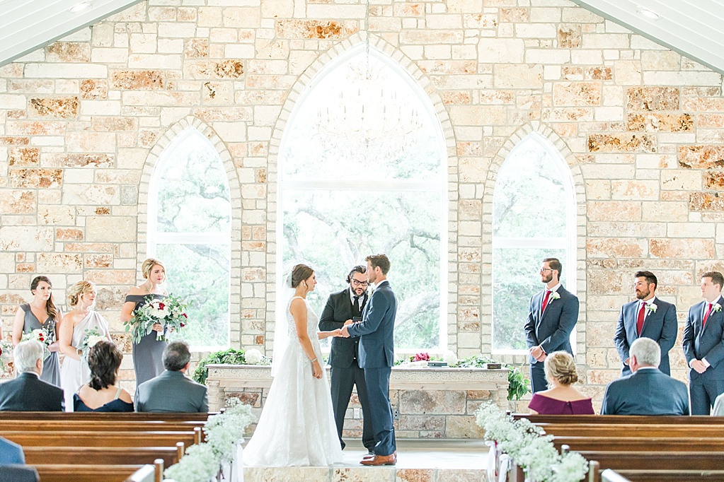 The Chandelier of Gruene New Braunfels Wedding photos featuring burgundy, navy, and grey wedding colors by Allison Jeffers Photography 0052