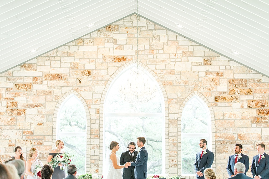 The Chandelier of Gruene New Braunfels Wedding photos featuring burgundy, navy, and grey wedding colors by Allison Jeffers Photography 0054