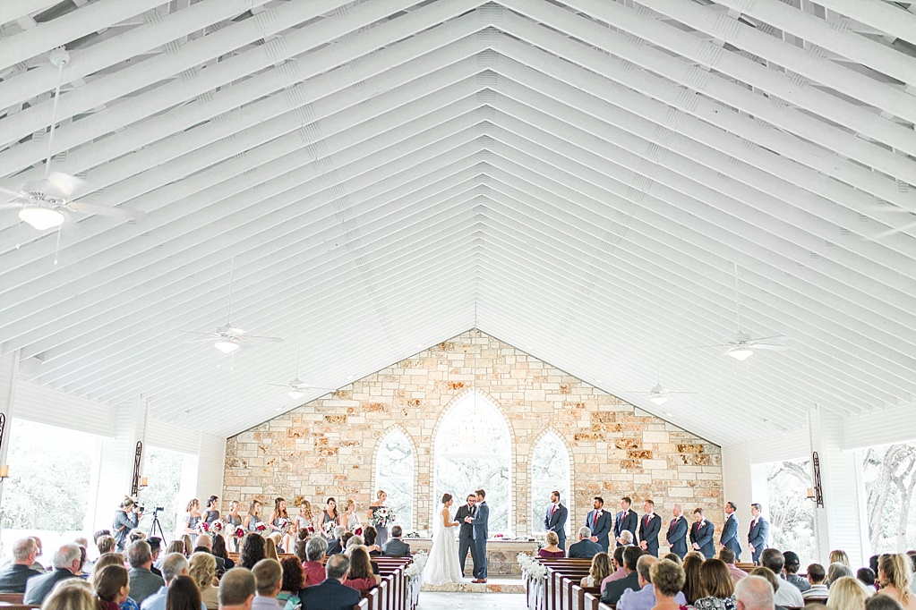 The Chandelier of Gruene New Braunfels Wedding photos featuring burgundy, navy, and grey wedding colors by Allison Jeffers Photography 0055
