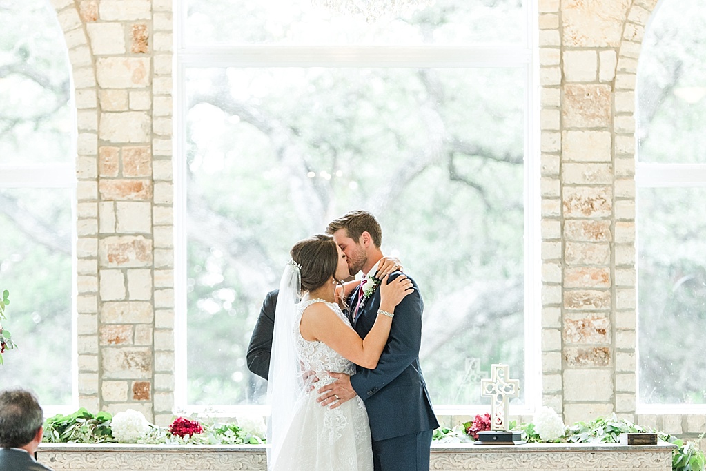 The Chandelier of Gruene New Braunfels Wedding photos featuring burgundy, navy, and grey wedding colors by Allison Jeffers Photography 0061