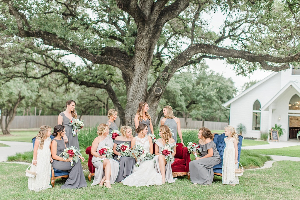 The Chandelier of Gruene New Braunfels Wedding photos featuring burgundy, navy, and grey wedding colors by Allison Jeffers Photography 0087