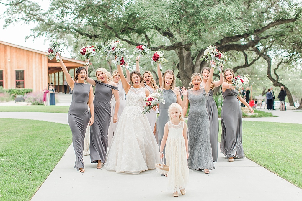 The Chandelier of Gruene New Braunfels Wedding photos featuring burgundy, navy, and grey wedding colors by Allison Jeffers Photography 0088