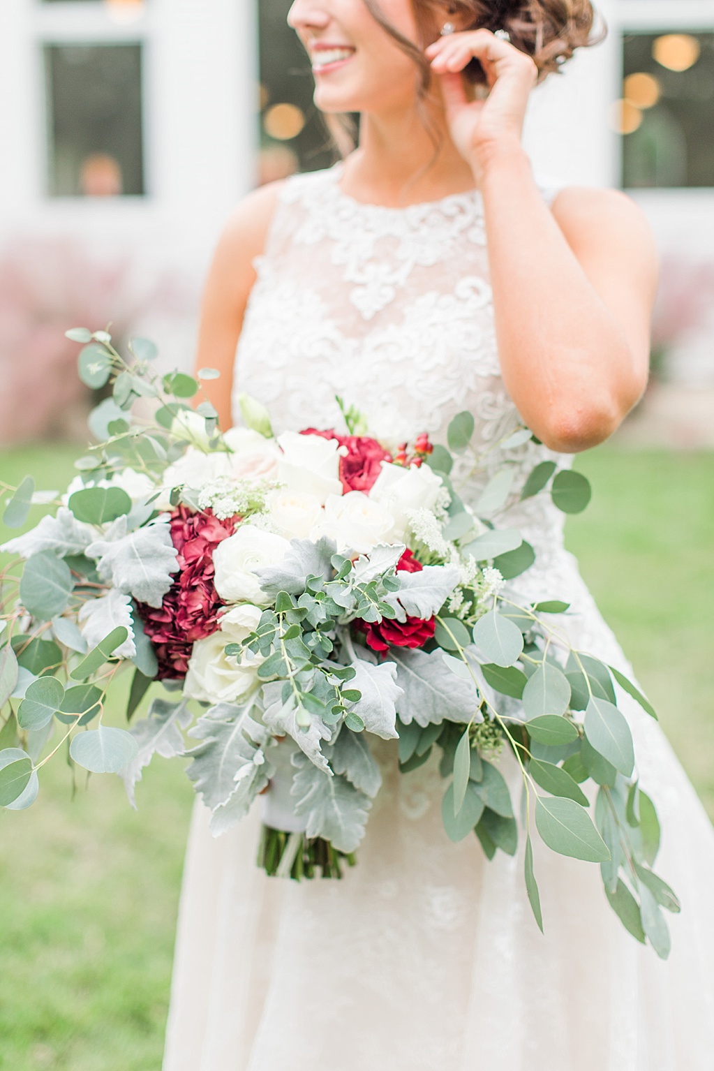 The Chandelier of Gruene New Braunfels Wedding photos featuring burgundy, navy, and grey wedding colors by Allison Jeffers Photography 0102