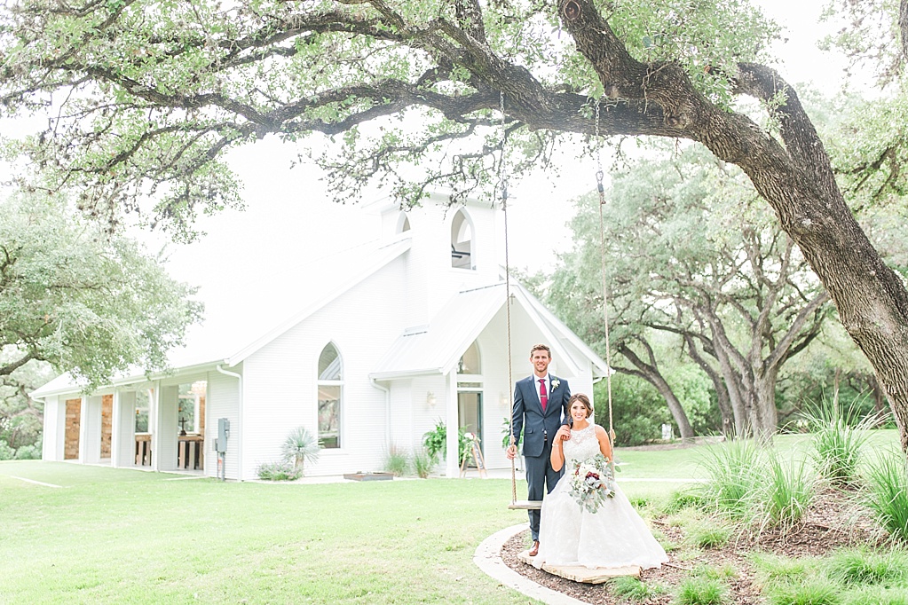 The Chandelier of Gruene New Braunfels Wedding photos featuring burgundy, navy, and grey wedding colors by Allison Jeffers Photography 0103