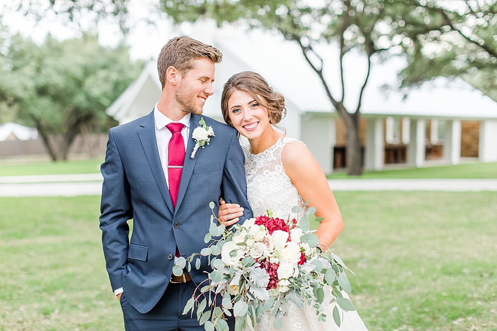 The Chandelier of Gruene New Braunfels Wedding photos featuring burgundy, navy, and grey wedding colors by Allison Jeffers Photography 0117