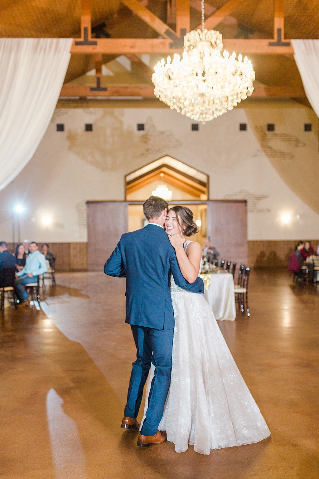 The Chandelier of Gruene New Braunfels Wedding photos featuring burgundy, navy, and grey wedding colors by Allison Jeffers Photography 0138