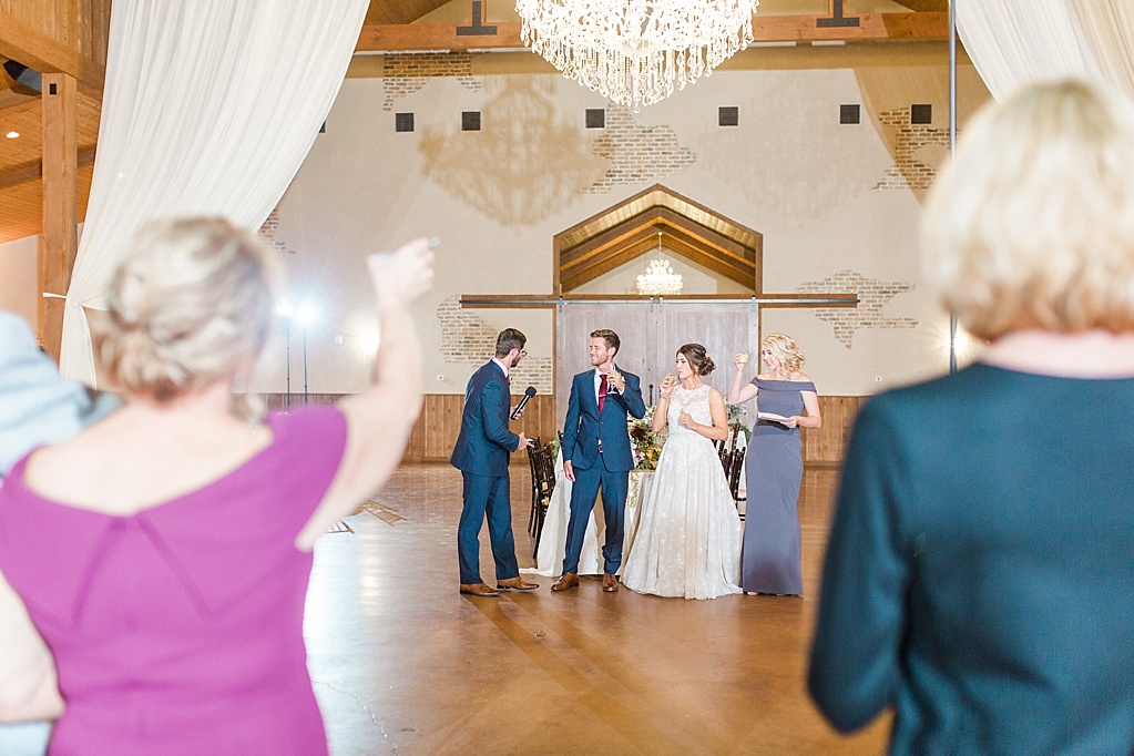 The Chandelier of Gruene New Braunfels Wedding photos featuring burgundy, navy, and grey wedding colors by Allison Jeffers Photography 0154