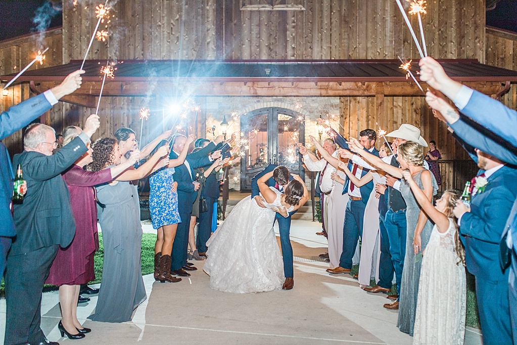 The Chandelier of Gruene New Braunfels Wedding photos featuring burgundy, navy, and grey wedding colors by Allison Jeffers Photography 0172