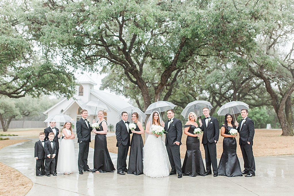 A Rainy Day Black and White Wedding at The Chandelier of Gruene 0053
