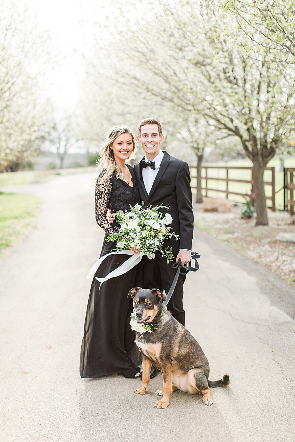 King River Ranch Wedding Venue in Johnson City Engagement Photos in the white Pear blossoms by Allison Jeffers Wedding Photography 0005