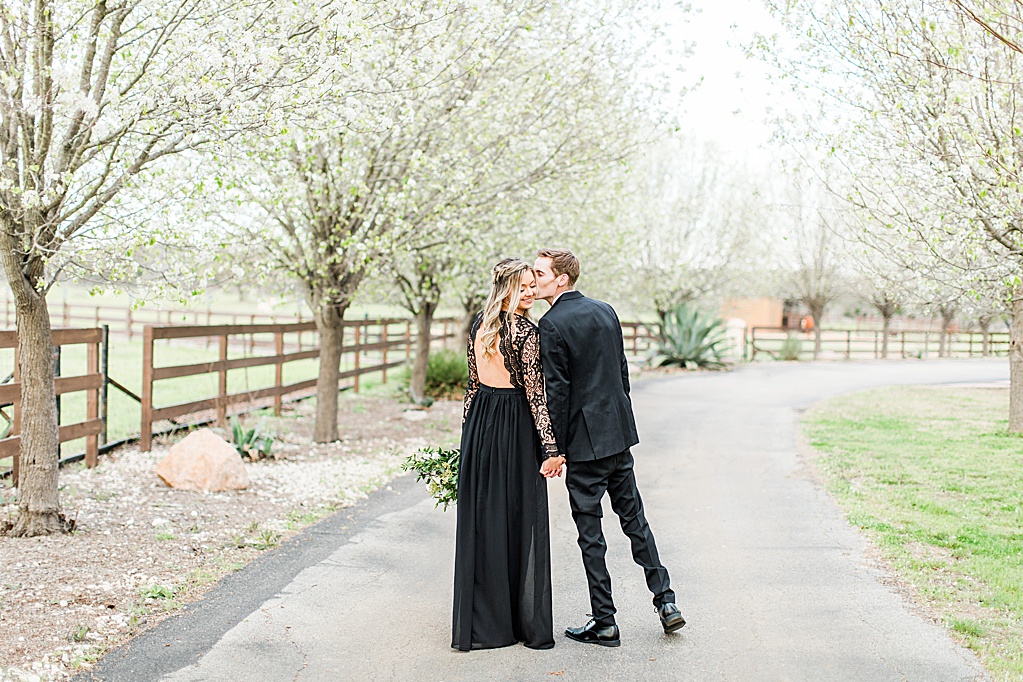 King River Ranch Wedding Venue in Johnson City Engagement Photos in the white Pear blossoms by Allison Jeffers Wedding Photography 0039