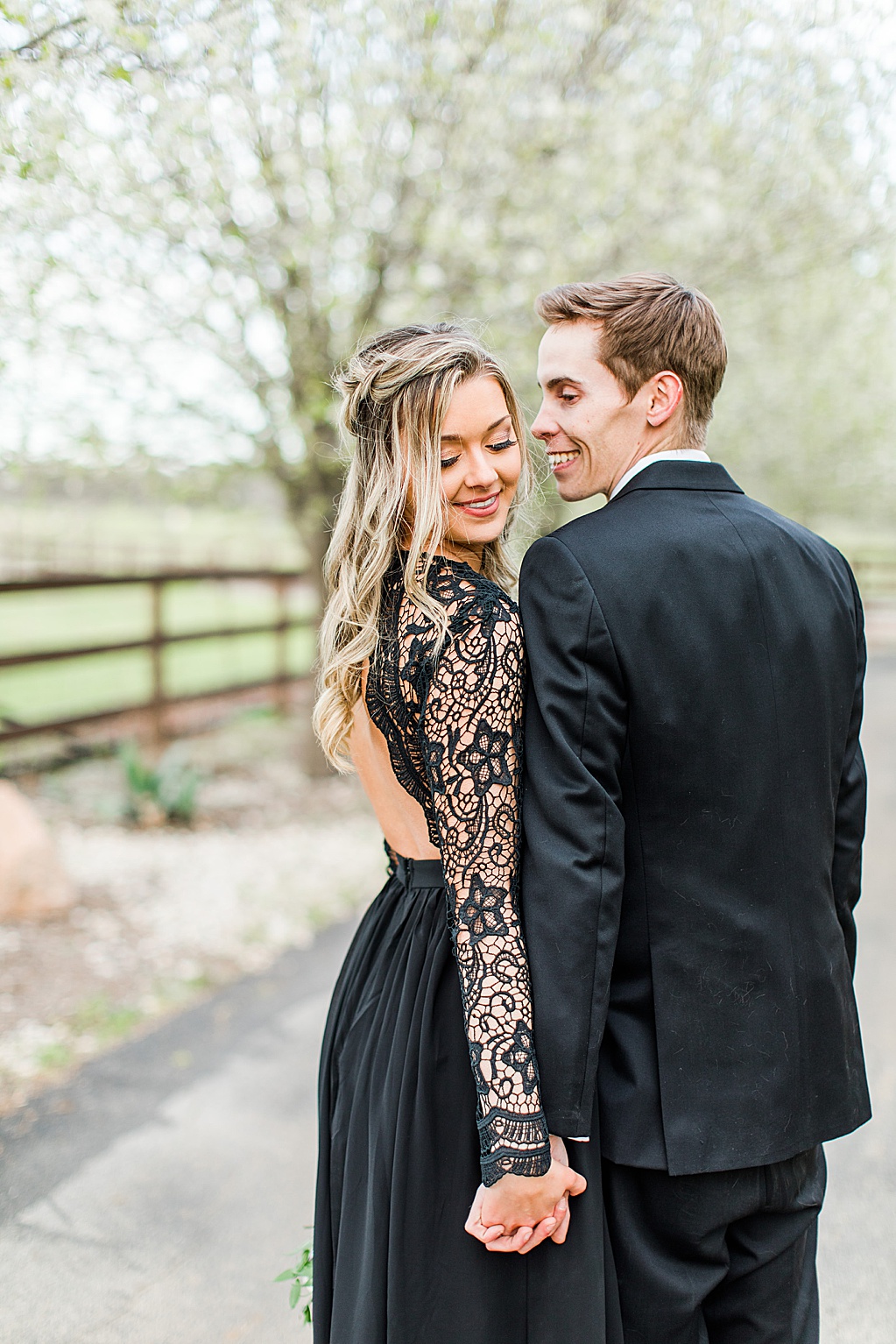 King River Ranch Wedding Venue in Johnson City Engagement Photos in the white Pear blossoms by Allison Jeffers Wedding Photography 0041