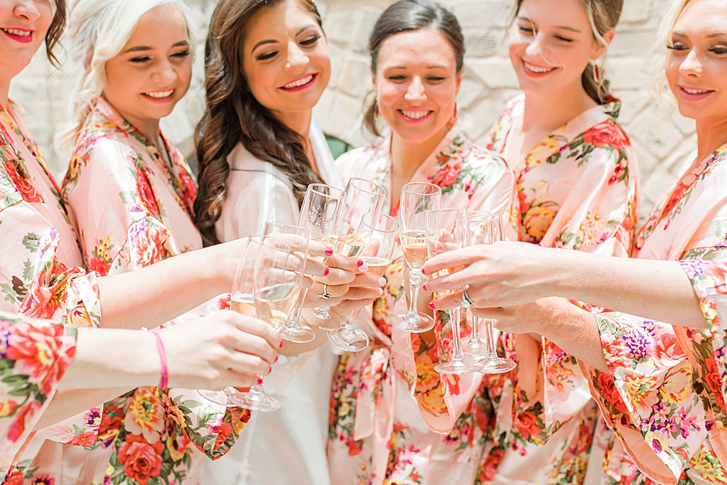 A Summer Wedding at Hotel Emma in San Antonio featuring hot pink bougainvillea florals 0020