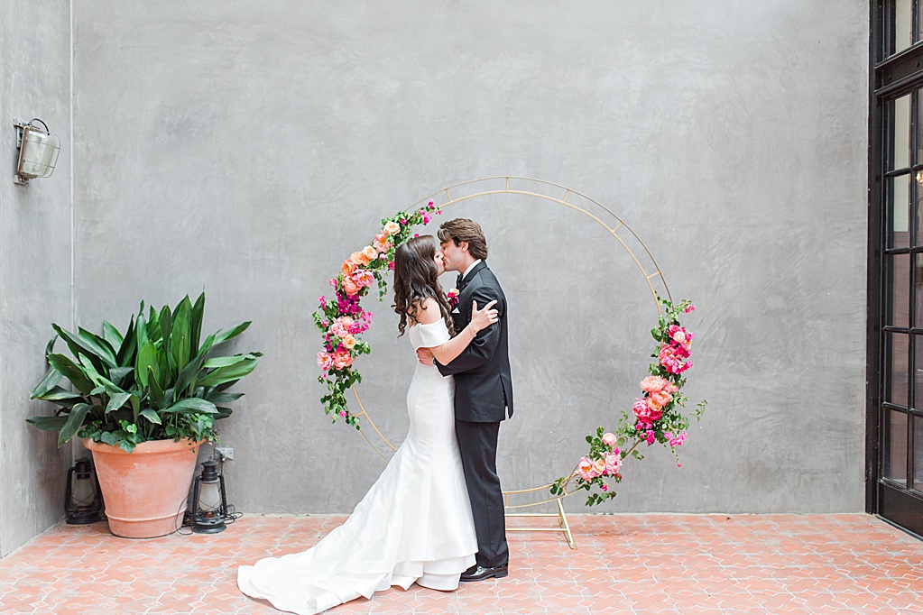 A Summer Wedding at Hotel Emma in San Antonio featuring hot pink bougainvillea florals 0044