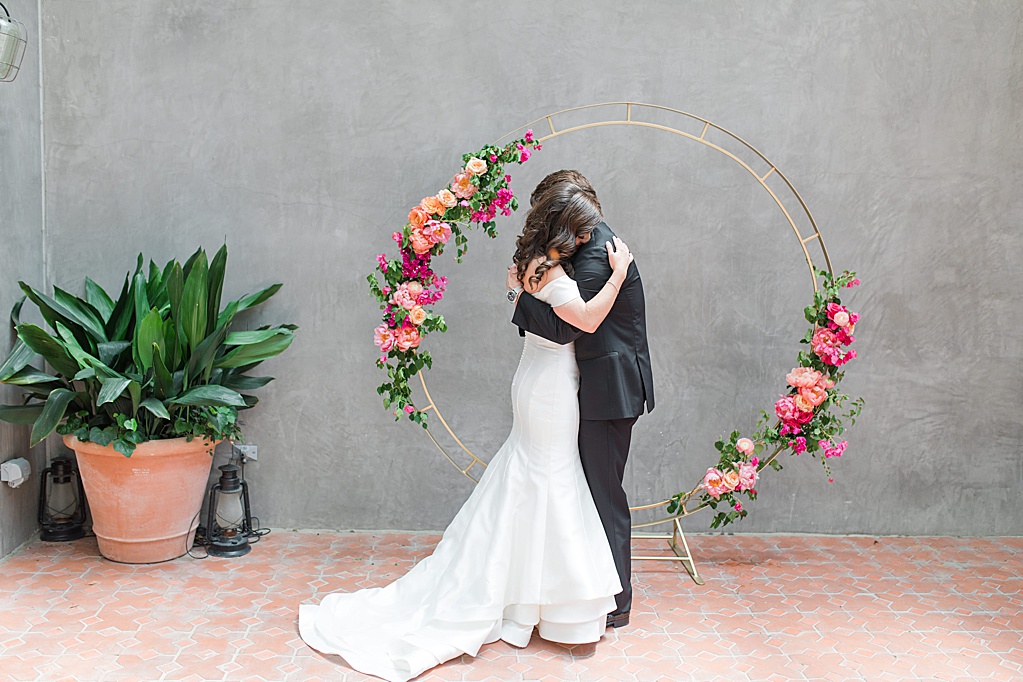 A Summer Wedding at Hotel Emma in San Antonio featuring hot pink bougainvillea florals 0045