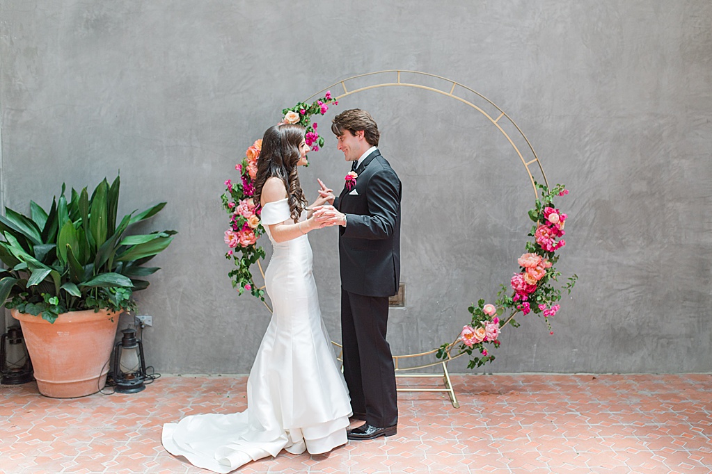 A Summer Wedding at Hotel Emma in San Antonio featuring hot pink bougainvillea florals 0046