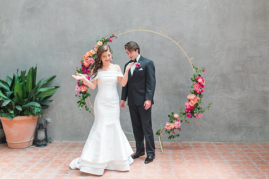 A Summer Wedding at Hotel Emma in San Antonio featuring hot pink bougainvillea florals 0049