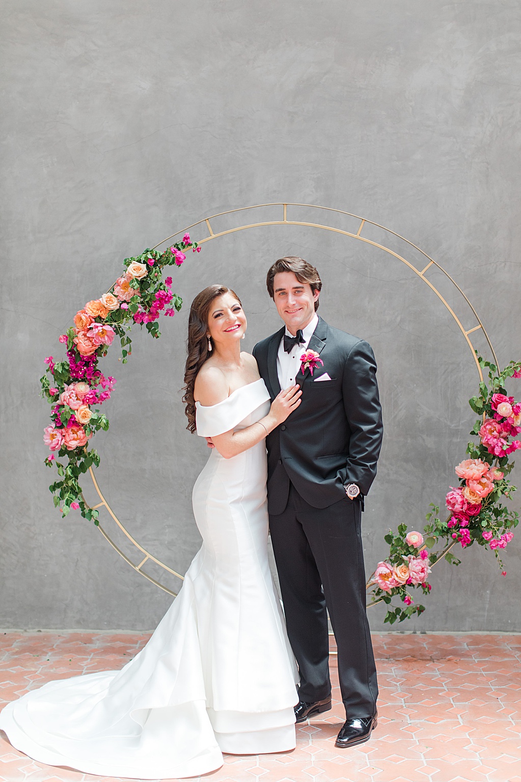 A Summer Wedding at Hotel Emma in San Antonio featuring hot pink bougainvillea florals 0050