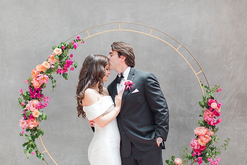 A Summer Wedding at Hotel Emma in San Antonio featuring hot pink bougainvillea florals 0053