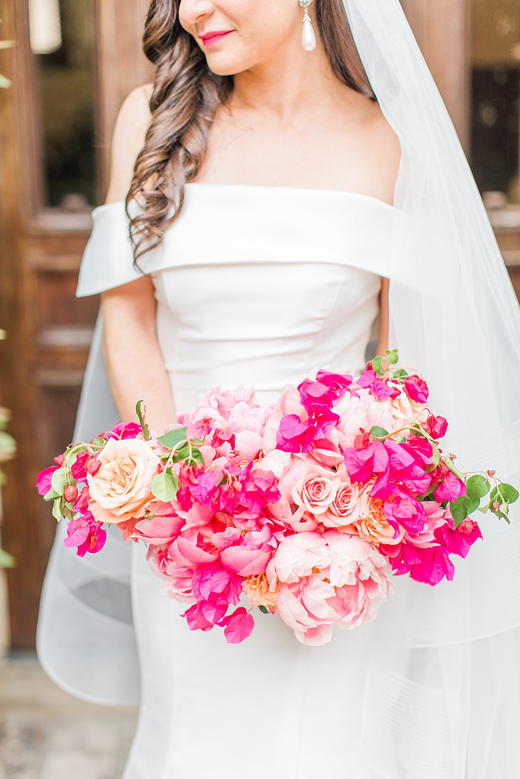 A Summer Wedding at Hotel Emma in San Antonio featuring hot pink bougainvillea florals 0159