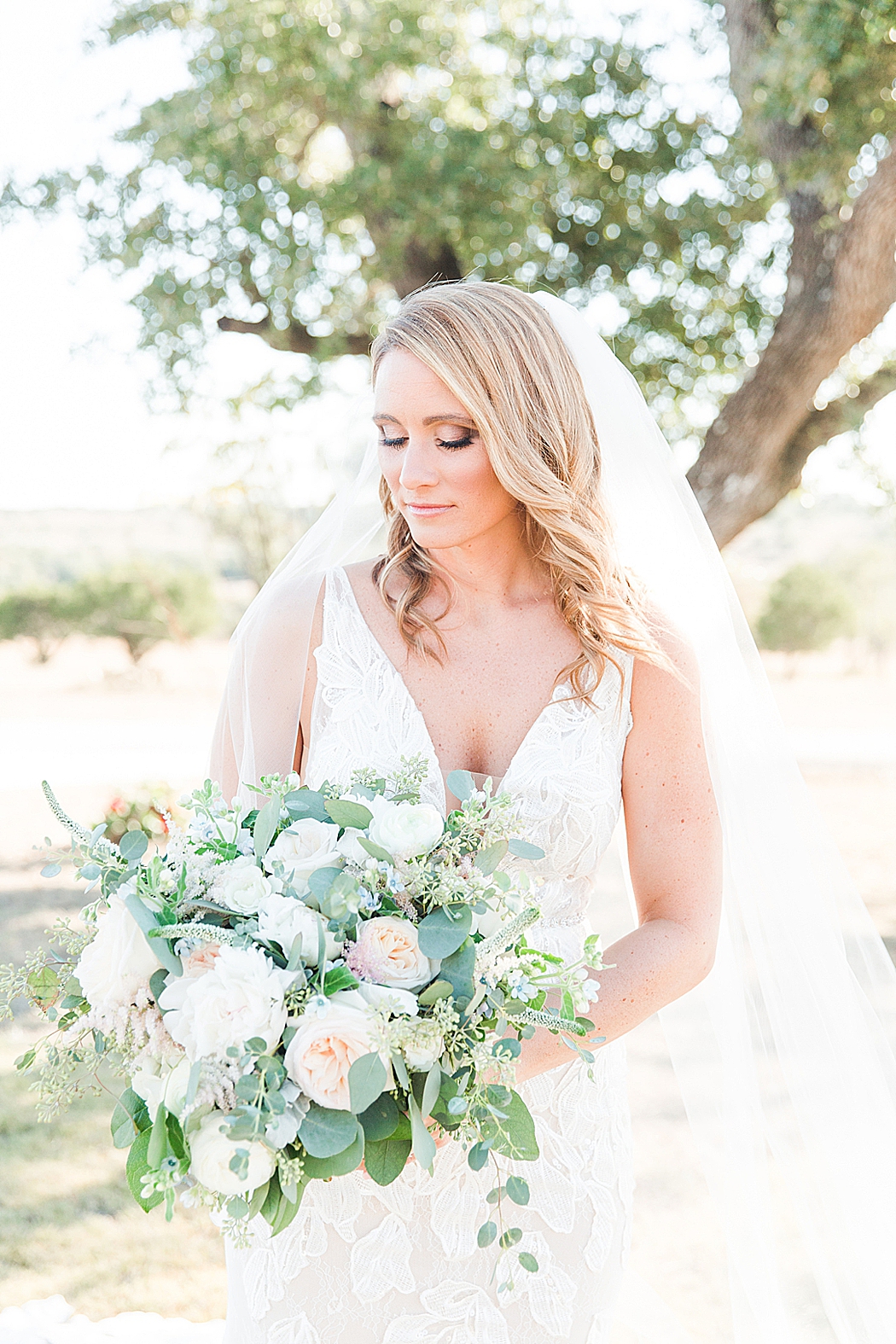 A greenery and dusty blue wedding at Sunset Ranch Event Center in Fredericksburg Texas by Allison Jeffers Associate Photographer 0128
