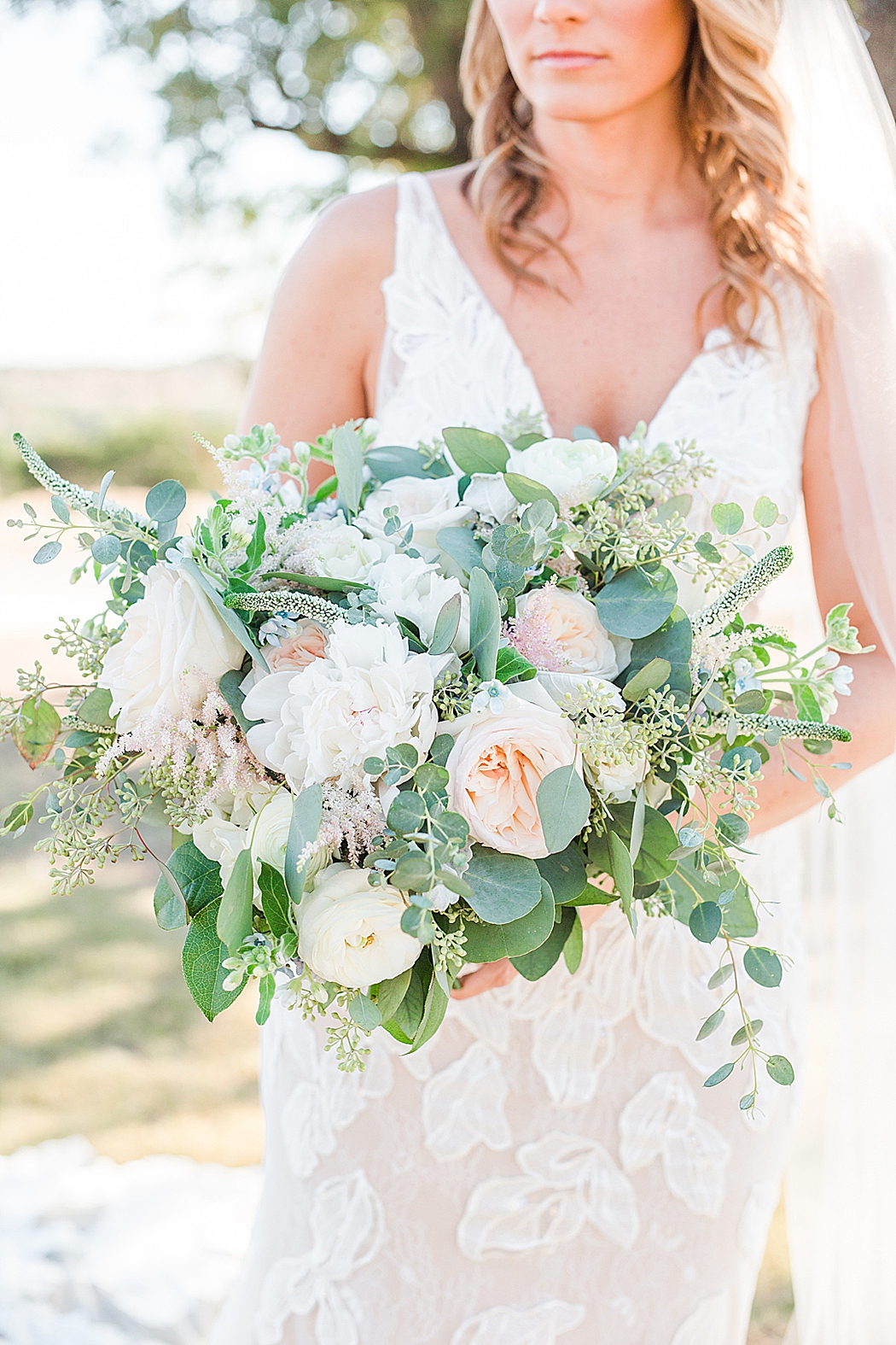 A greenery and dusty blue wedding at Sunset Ranch Event Center in Fredericksburg Texas by Allison Jeffers Associate Photographer 0129