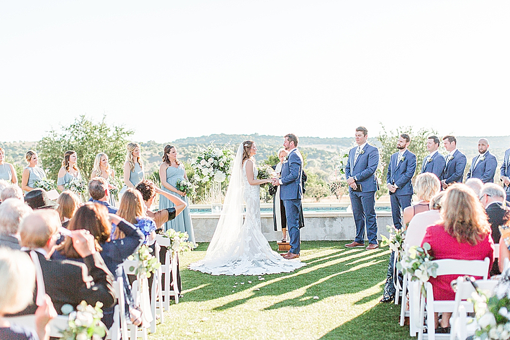 A greenery and dusty blue wedding at Sunset Ranch Event Center in Fredericksburg Texas by Allison Jeffers Associate Photographer 0147