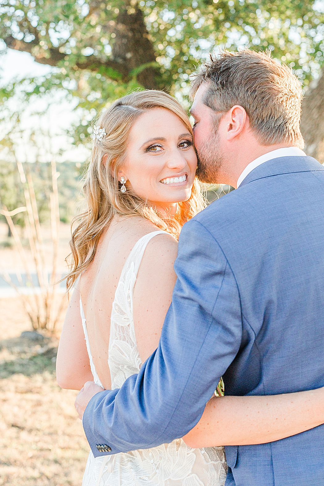 A greenery and dusty blue wedding at Sunset Ranch Event Center in Fredericksburg Texas by Allison Jeffers Associate Photographer 0158