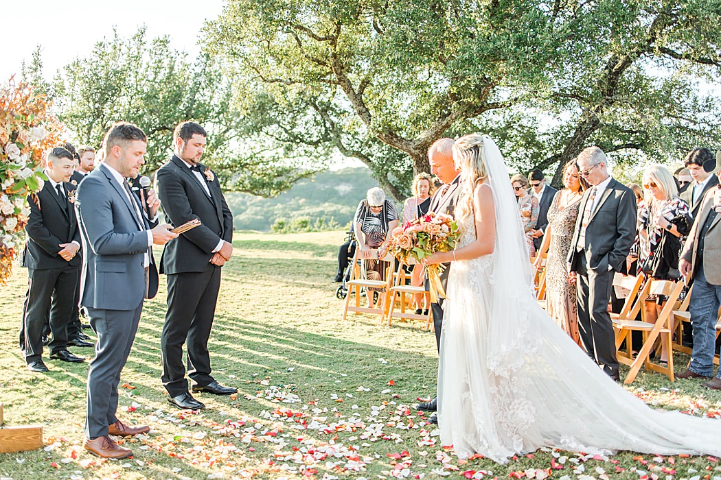 A Grey and Peach Fall Wedding at Contigo Ranch in Fredericksburg Texas by Allison Jeffers Photography 00032