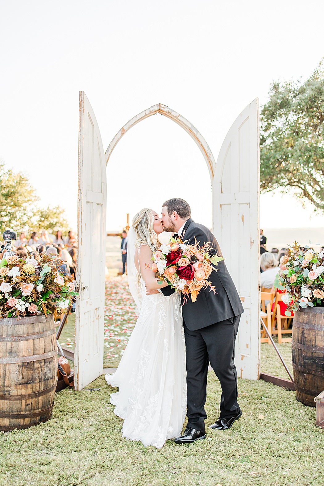 A Grey and Peach Fall Wedding at Contigo Ranch in Fredericksburg Texas by Allison Jeffers Photography 0004