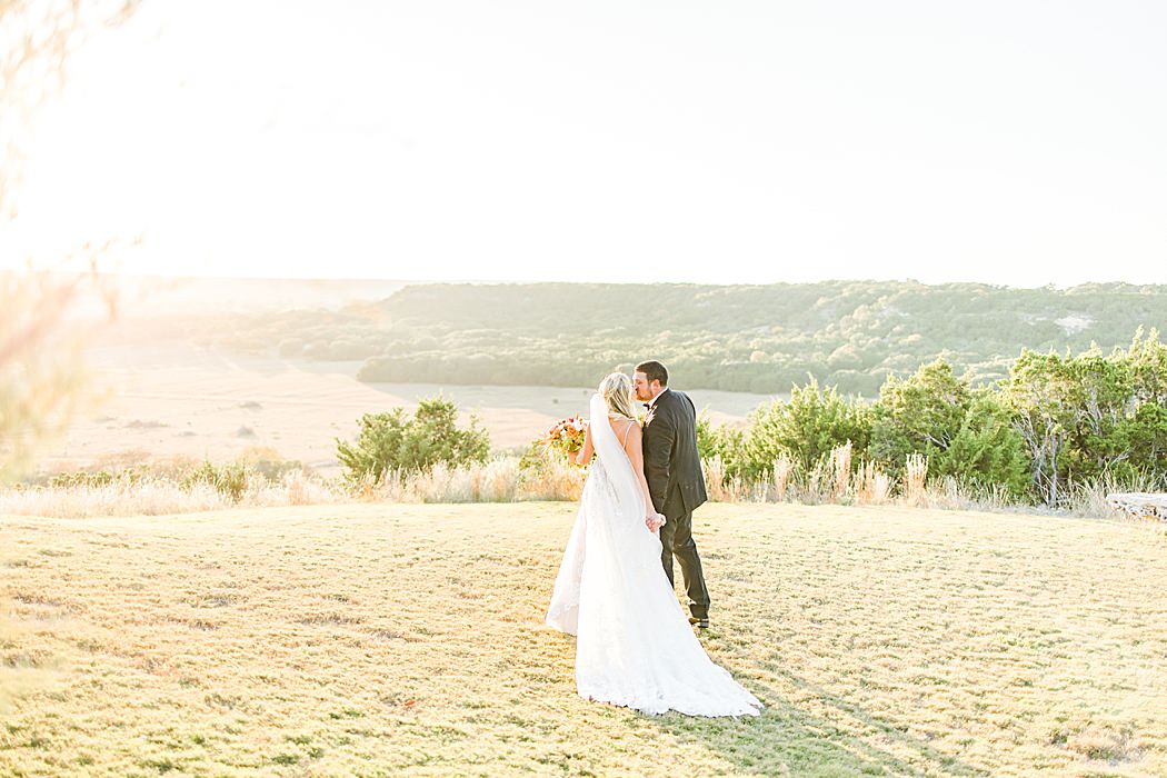 A Grey and Peach Fall Wedding at Contigo Ranch in Fredericksburg Texas by Allison Jeffers Photography 00044